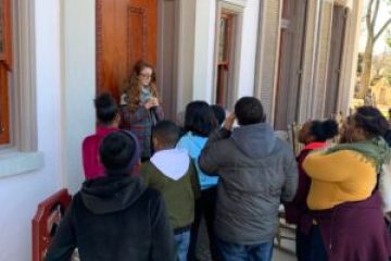a group of people standing in a room
