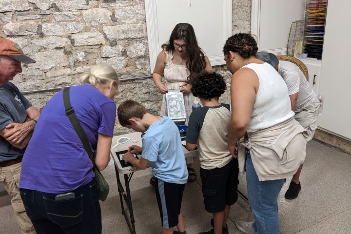 a group of people standing in a room
