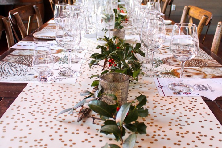 a dining table filled with wine glasses