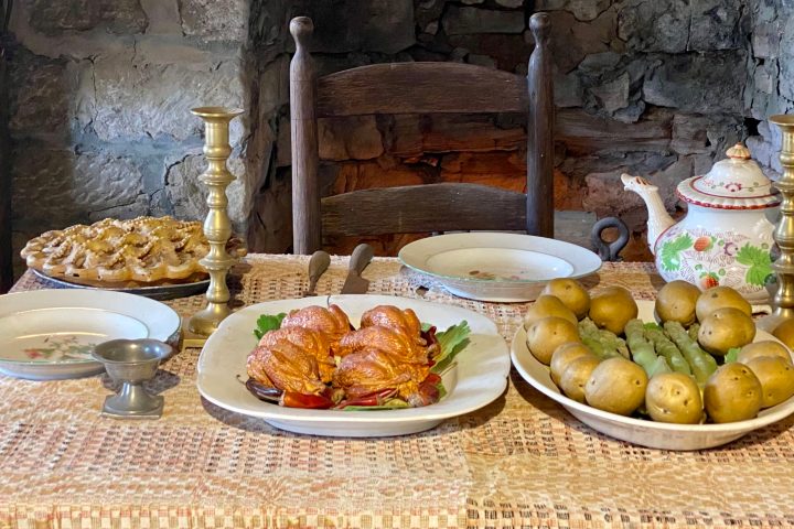 a table topped with plates of food on a plate