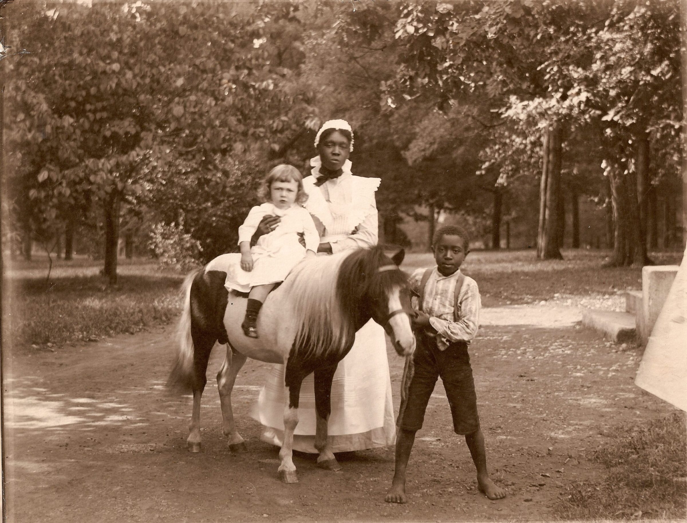 a vintage photo of a man riding a horse