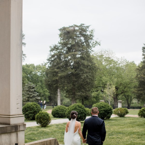 a person standing on a sidewalk