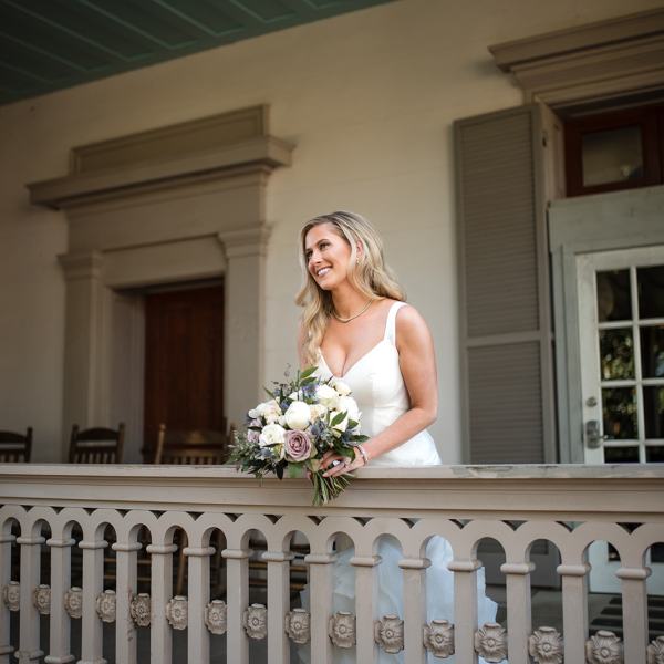 a woman standing in front of a building
