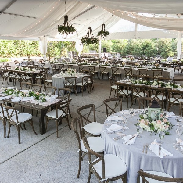 a dining room table in front of a building