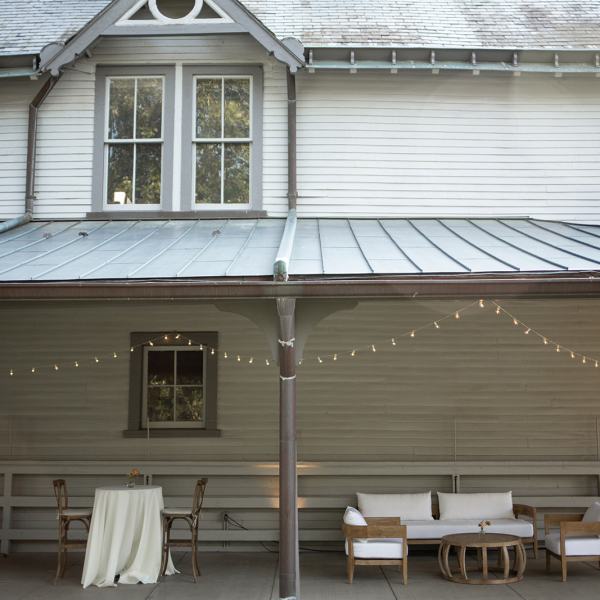 a chair sitting in front of a building